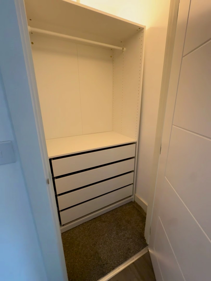 Fitted wardrobe interior with drawers